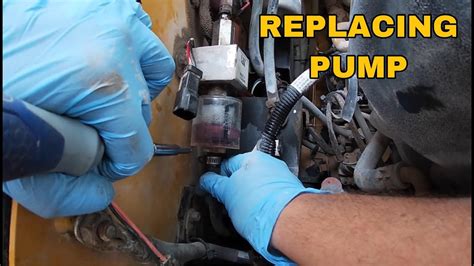 cat skid loader injector change